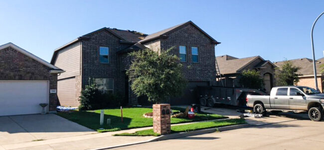 Applying Shingles to New Roof in Haslet TX