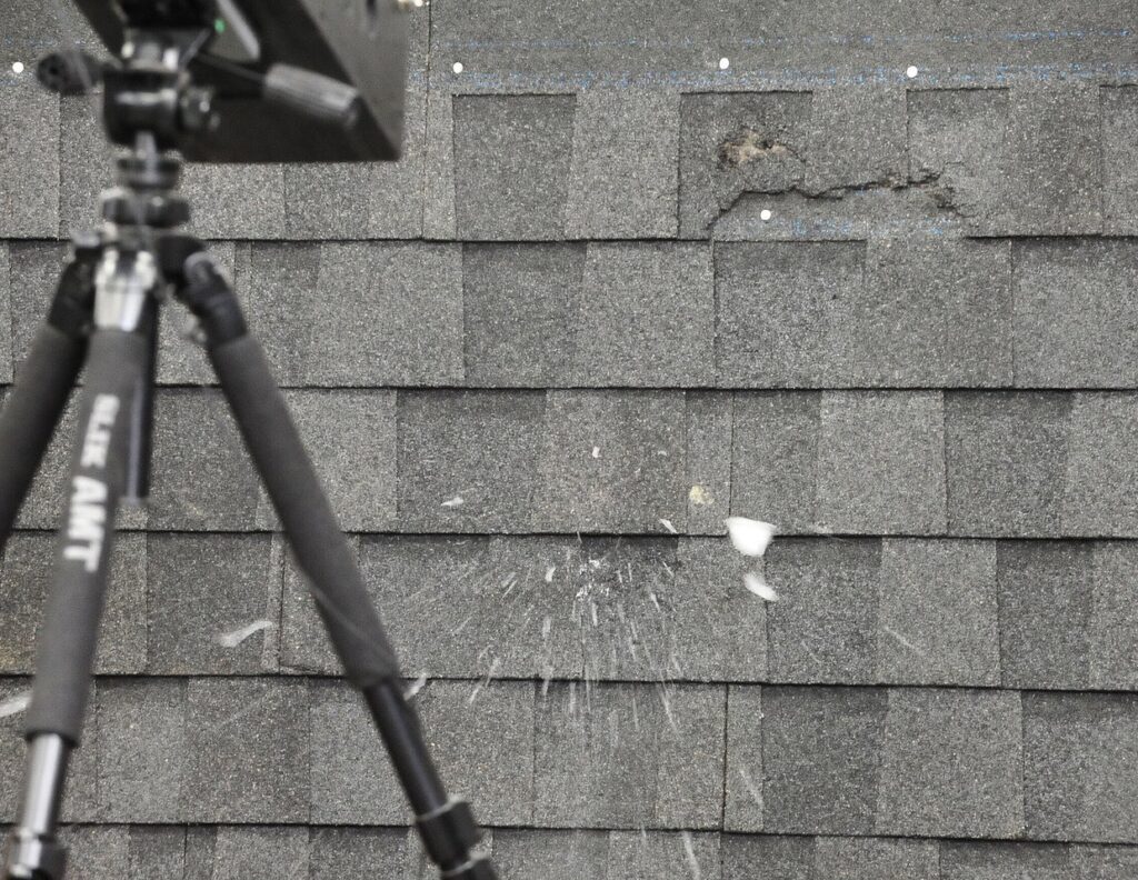 Inspecting hail damage to a roof